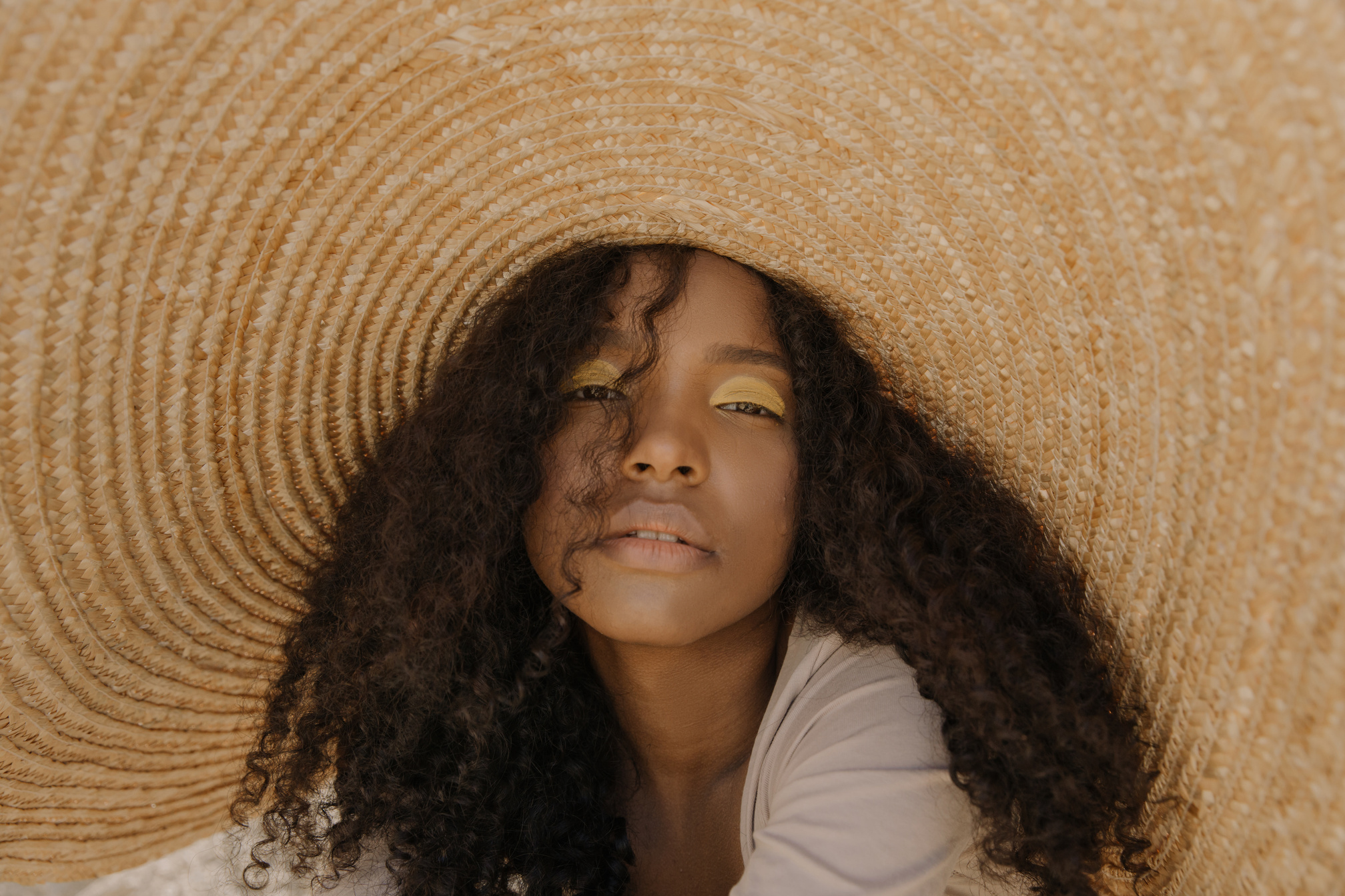 Girl in White Shirt Wearing Brown Straw Hat